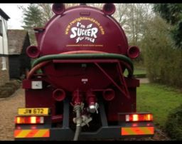 <img src="tanker.jpg" alt="Septic tank emptying truck with 'I'm a Sucker for You' slogan on the side">